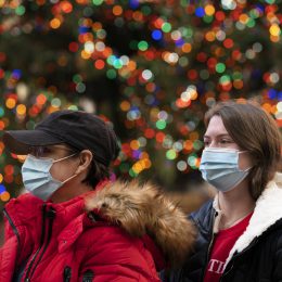 Thursday, Dec. 3, 2020 in New York. What’s normally a chaotic, crowded tourist hotspot during the holiday season is instead a mask-mandated, time-limited, socially distanced locale due to the coronavirus pandemic. (AP Photo/Mark Lennihan)