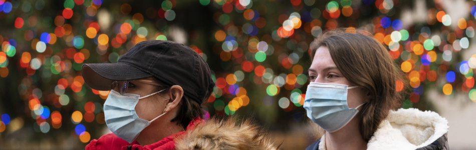 Thursday, Dec. 3, 2020 in New York. What’s normally a chaotic, crowded tourist hotspot during the holiday season is instead a mask-mandated, time-limited, socially distanced locale due to the coronavirus pandemic. (AP Photo/Mark Lennihan)